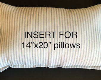 May include: A white pillowcase with blue stripes, labeled "INSERT FOR 14"x20" pillows".