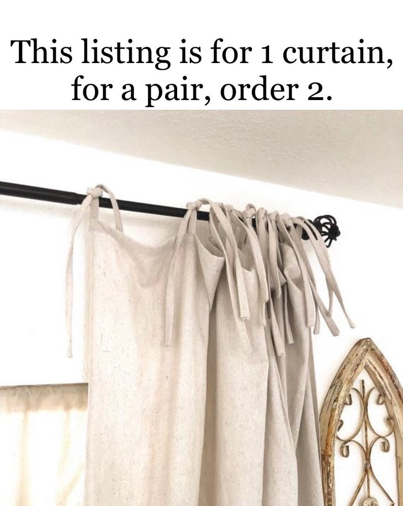 May include: A pair of off-white linen curtains with a simple tie-top design. The curtains are hung on a black rod and are gathered at the top. The text "This listing is for 1 curtain, for a pair, order 2." is visible at the top of the image.