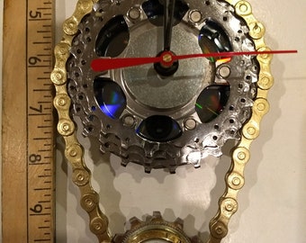 Clock made from recycled bike parts plus temperature gauge