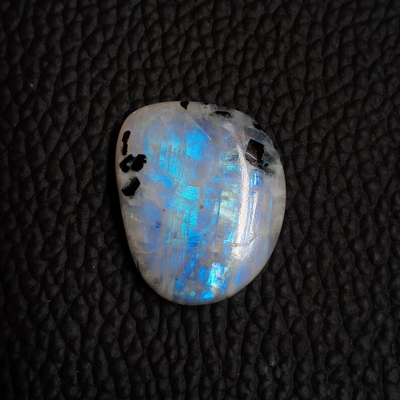 Fancy Shape Designer Gemstone Blue Flashy Moonstone Rainbow Moonstone With Black Tourmaline Cabochon Size 26*15*7mm 28Cts Loose Gemstone