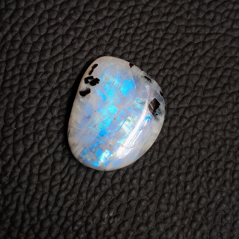 Fancy Shape Designer Gemstone Blue Flashy Moonstone Rainbow Moonstone With Black Tourmaline Cabochon Size 26*15*7mm 28Cts Loose Gemstone