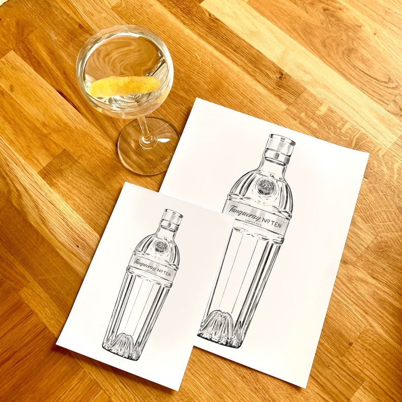 May include: Two black and white illustrations of a clear glass bottle with a label that reads "Tanqueray No Ten" on a white background.