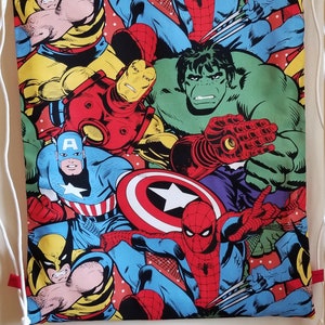 May include: A red drawstring bag with a colorful print of various Marvel superheroes, including Spider-Man, Wolverine, Hulk, Iron Man, and Captain America.