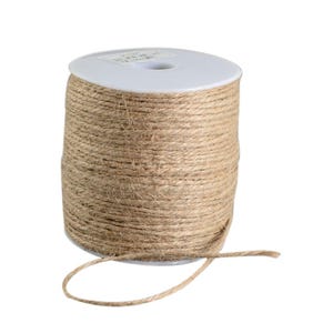 May include: A spool of natural jute twine. The twine is tightly wound around a white plastic core. A length of the twine extends from the spool, forming a loop. The twine has a rough, textured appearance and a light brown colour.