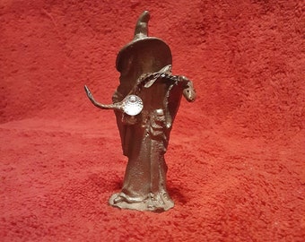 Pewter wizard holding dragon and genuine crystal
