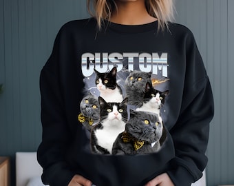 May include: Black sweatshirt with a graphic of multiple cats in a retro style with the word "CUSTOM" in silver letters.