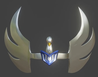 May include: A silver-colored, stylized bird with a blue and white crest, with two silver wings extending out to the sides.