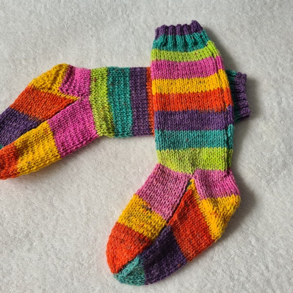 Hand knitted child's socks. Rainbow striped socks, suitable for a 8 to 10 year old. Birthday gift. Christmas present. Stocking filler.