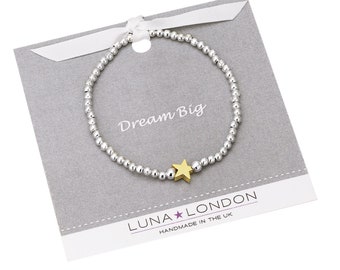 Dream Big - Gold star stretch bracelet on a gift card with printed message area