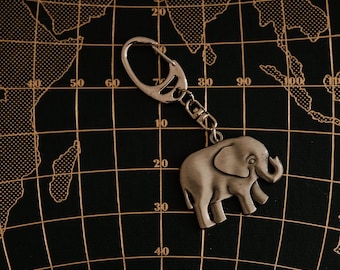 Elephant keyring with 'Safe Trip' message and free gift tag