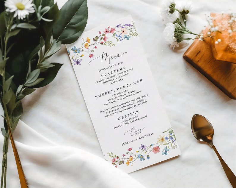 May include: A wedding menu with floral illustrations and the text "Menu, September 14, 2021". The menu lists starters, a buffet and pasta bar, dessert, and coffee options.