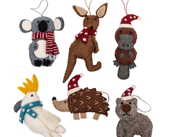 May include: Set of six felt Christmas ornaments featuring Australian animals wearing Santa hats. The ornaments include a koala, kangaroo, echidna, platypus, wombat, and a cockatoo.