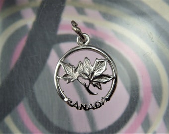 Vintage 1970s silver Canada  " charm