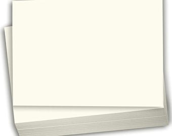 May include: A stack of blank ivory card stock paper.