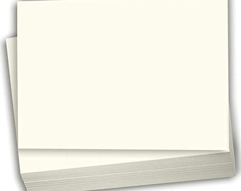 May include: A stack of blank white card stock paper.