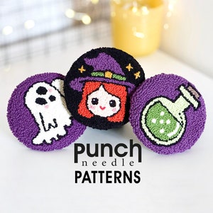 May include: Three purple felt circles with different Halloween-themed punch needle embroidery designs: a ghost, a witch, and a potion bottle. The text "Punch needle patterns" is printed below the circles.