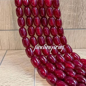 Cuentas gruesas de ágata cornalina, 13 x 18 mm. Cuentas cilíndricas de ágata roja lisa, orificio de 1,4 mm, cuentas ovaladas de ágata, 22 cuentas por tira completa. Tira de 38 cm (15"), A698
