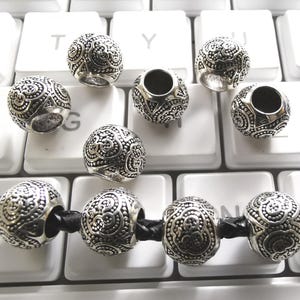 20 cuentas Ohm de plata antigua con agujero grande, cuentas espaciadoras de metal de 10 x 9 mm, estilo tibetano, cuentas nepalesas, para bisutería DIY. B296