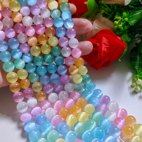 thumbnail image 2 of Natural Pink Cat's Eye Calcite Selenite Round Beads Loose 6/8/10/12/14mm 2 of 6