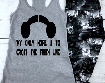 May include: Gray tank top with a black graphic of a Star Wars character's helmet and the text "My only hope is to cross the finish line".