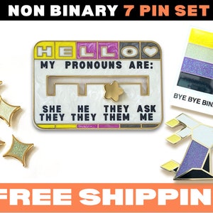 May include: A set of seven enamel pins featuring a non-binary pride flag, a pin that says "Hello, my pronouns are: they/them", and five glitter star pins in yellow, white, and purple. The pins are on a white background. Free shipping.