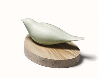 A Bird on the Wooden Leaf