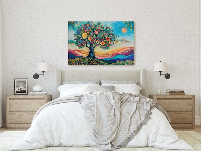 May include: A colorful painting of a tree with flowers and a sun in the sky. The tree is in a field with rolling hills in the background. The painting is on a canvas and is hanging on a wall in a bedroom.