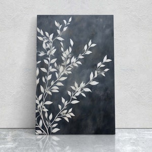 May include: Abstract painting with a dark blue background and white branches with leaves. The painting has a textured look and a modern style.