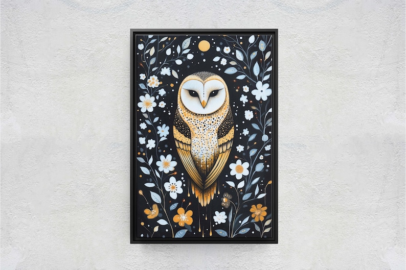 May include: A black framed canvas painting of a barn owl with yellow and brown feathers, perched in a field of white flowers with blue and green leaves on a black background.