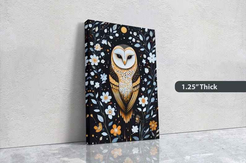 May include: A canvas print featuring a stylised illustration of a barn owl with yellow and white feathers, surrounded by white flowers and black vines on a black background. The text "1.25" Thick" is visible in the lower right corner of the image.