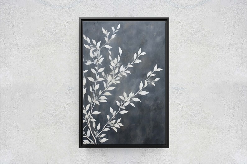 May include: A framed abstract painting with a dark blue background and white stylized branches with leaves.