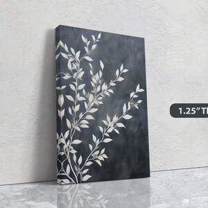 May include: A dark blue canvas print with a white floral design. The print is 1.25 inches thick.