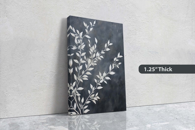 May include: A dark blue canvas print with a white floral design. The print is 1.25 inches thick.