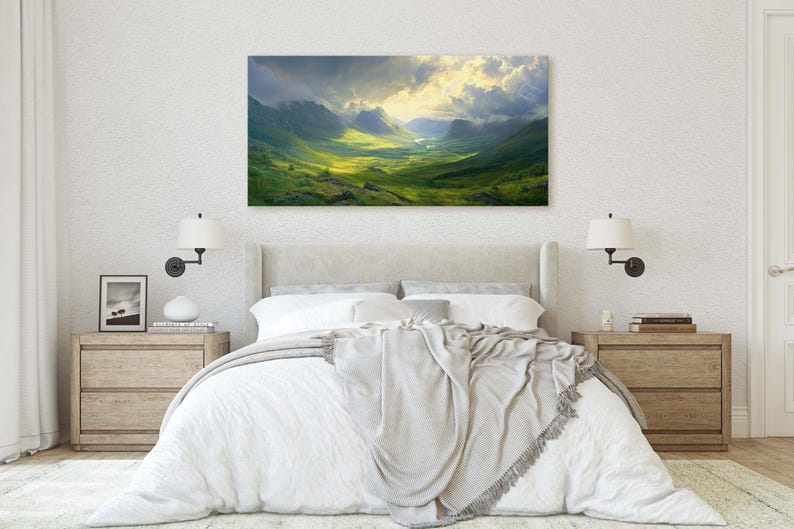 May include: A panoramic landscape photograph of a valley with rolling green hills and mountains in the distance. The sky is cloudy with a bright light shining through the clouds.
