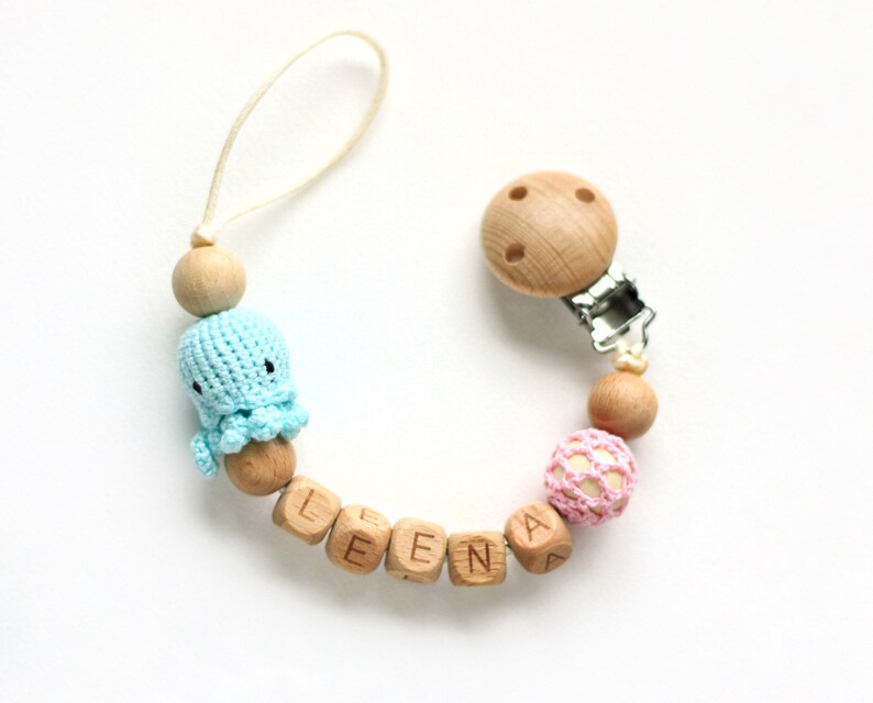 Personalized pacifier clip with crochet jellyfish in blue colour