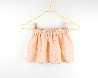 Children's skirt organic muslin in apricot with red cups, from size 80-92