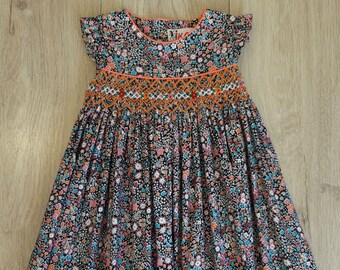 Embroidered and smocked girl dress