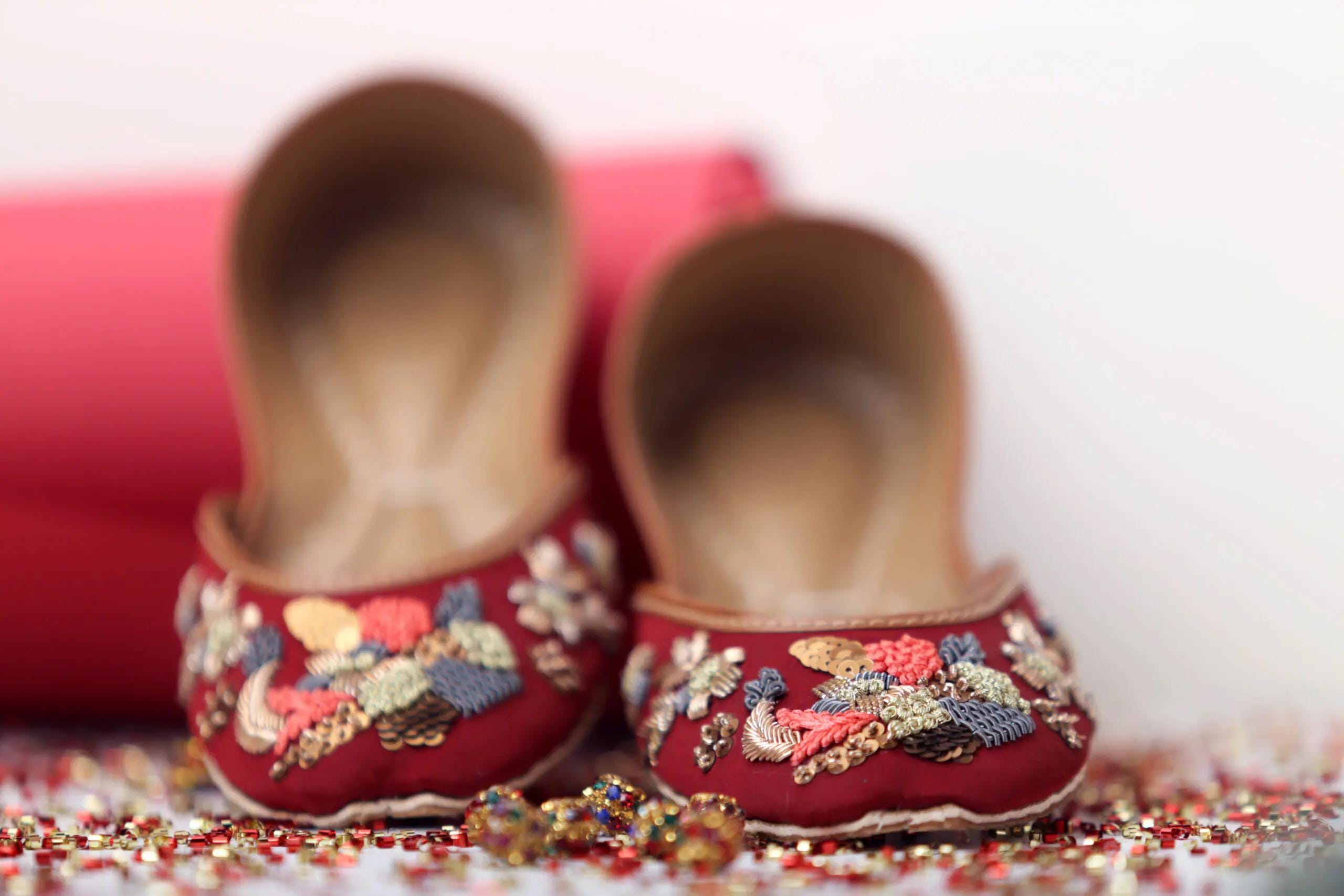 Petals & Prosperity – Embroidered Red Satin Flats | French Knot Sequin Juttis | Festive Handmade Shoes | Artistic Ethnic Footwear