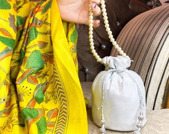 Silk Royalty: Silver Silk Cloth Potli Bag. Timeless Elegance with Ivory Beads Handle