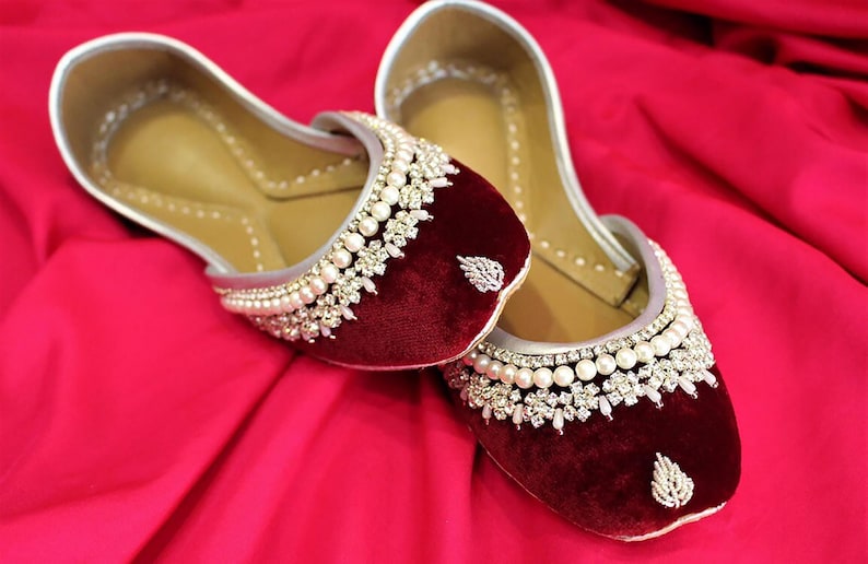 Rougé Royalty maroon velvet bridal flats with silver dabka leaf embroidery, faux pearls, and rhinestone accents, available in regular and custom wide-fit for wedding elegance and comfort.
