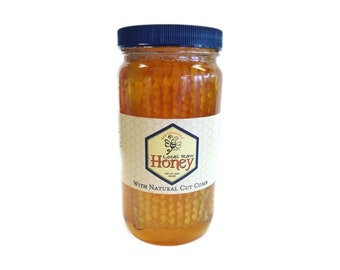 Honeycomb In Raw Honey. NY Light honey with comb pieces within. Pure raw honey 1.5 lbs