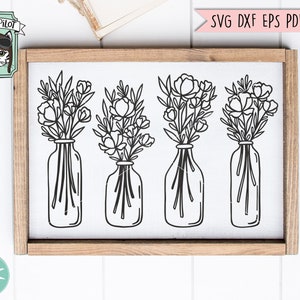 May include: Four black and white line drawings of flower bouquets in glass jars. The jars have a textured surface. The bouquets are arranged in a row on a white background.