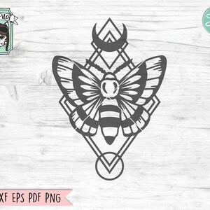 May include: Black and white silhouette of a moth with geometric shapes and a crescent moon. The moth is centered in a diamond shape with a circle at the bottom.