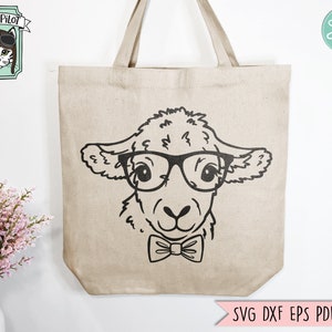 May include: A black and white illustration of a sheep wearing glasses and a bow tie. The sheep is on a beige tote bag.