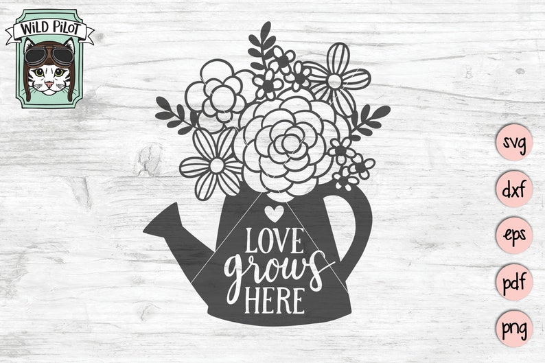 May include: Black and white silhouette of a watering can with flowers and the text "LOVE grows HERE" on a white wood background.