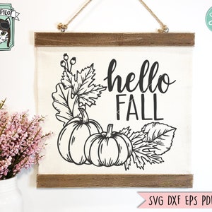 May include: Black and white illustration of pumpkins and leaves with the text "hello fall" on a white canvas with a wooden frame.
