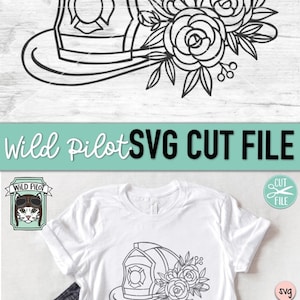 May include: A black and white line art design of a firefighter's helmet with flowers. The design is on a white t-shirt. The t-shirt is on a wooden surface.