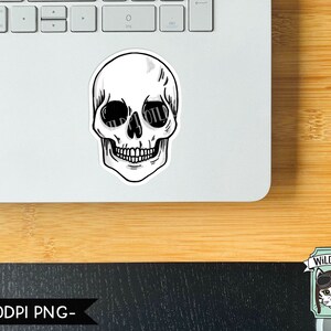May include: A black and white illustration of a skull with the word "WILD PILOT" written across the eyes.