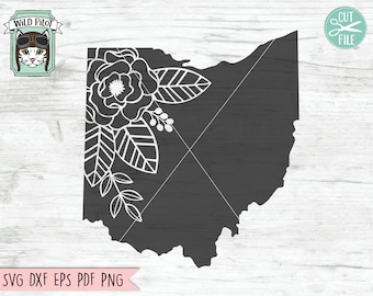 May include: A gray outline of the state of Ohio with a white floral design in the top left corner. The floral design includes a large rose, leaves, and stems.