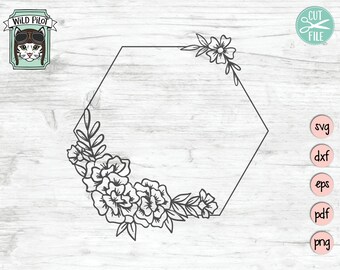 May include: A black and white line drawing of a hexagonal frame with floral embellishments. The frame is empty and ready for text or images. The flowers are stylized and have a vintage feel.